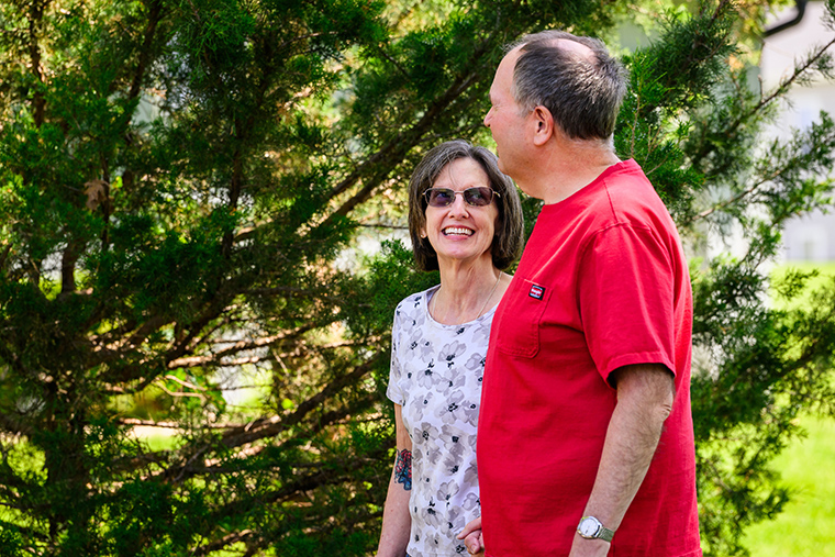 A man and a woman walking together.