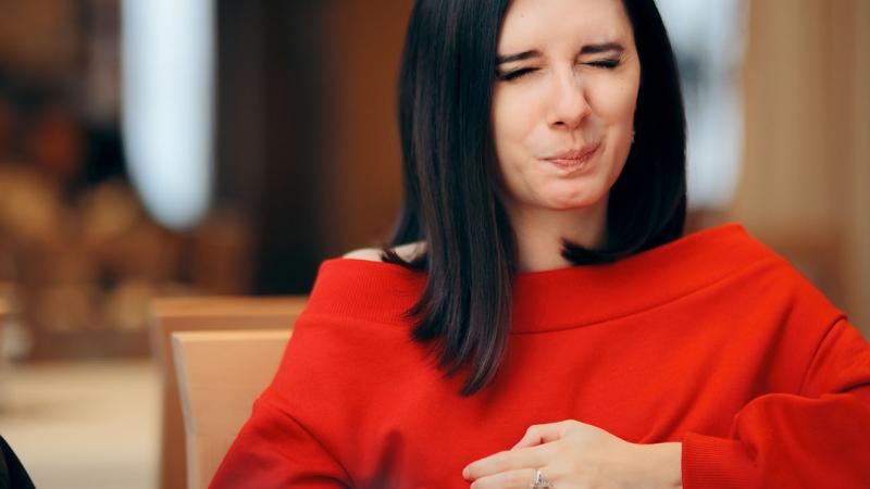 woman with heartburn
