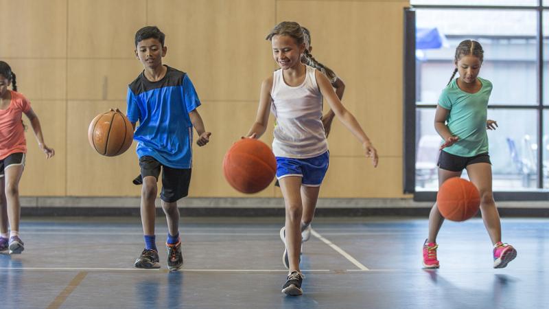 Kids playing basketball