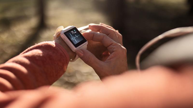 A person using a smart watch.