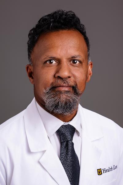 Ebby Varghese, MD headshot