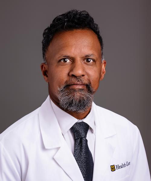 Ebby Varghese, MD headshot