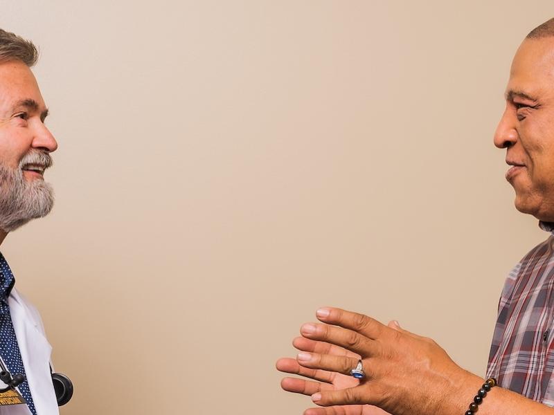 Doctor talking with patient