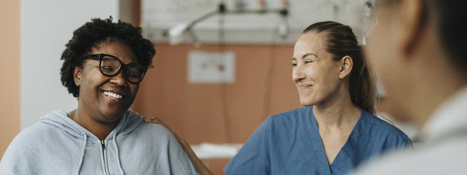 Doctor talking with patient