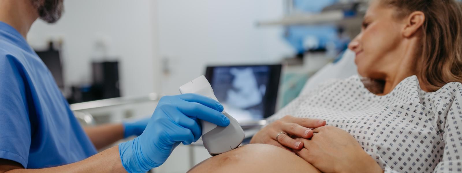 Pregnant female patient having an ultrasound